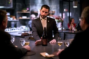 Beverage Director Scott Cameron describes Chateau de Hautville cider during a tasting menu service at Atera in New York, NY on Oct. 26, 2013. The cider was paired with dried beets. A matching drink service pairs various alcoholic beverages with each course, and Cameron describes each beverage for the clientele as they are served.