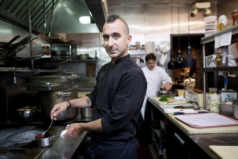 Marc Forgione poses in his eponymous restaurant in the Tribeca neighborhood of New York, NY on Sept. 4, 2013. Forgione is the son of legendary chef Larry Forgione.