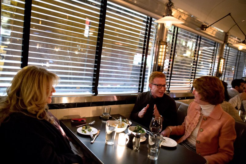 From left, Gail Levy, Martin Shanker, both of Manhattan, and Kelly Fairbairn, of Greenville, SC, dine at Empire Diner in New York, NY on Feb. 25, 2014. The trio was there for a business meeting. Empire Diner opened earlier this year. It was formerly The Highliner, and before that, a different incarnation of Empire Diner.