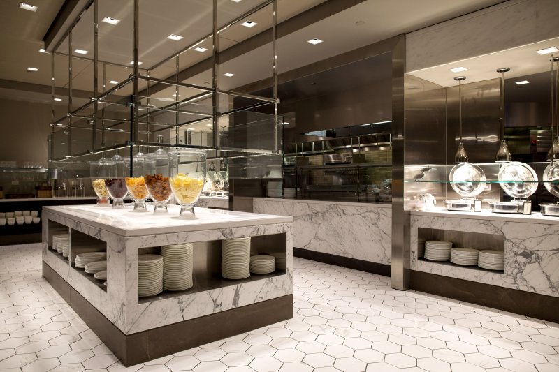 Patrons shop at Herb N' Kitchen, a new dining area at the Hilton Midtown in New York, NY on Sept. 17, 2013. The restaurant, which emphasizes ready-to-go and quickly prepared made-to-order foods, opened in July. 

CREDIT: Brian Harkin for The Wall Street Journal
FIXDECODE_Hilton