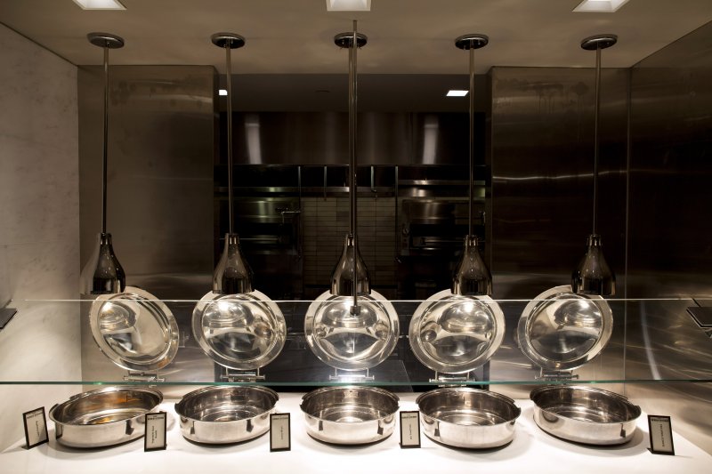 This is the breakfast buffet area (closed here during lunch) at Herb N' Kitchen, a new dining area at the Hilton Midtown in New York, NY on Sept. 17, 2013. The restaurant, which emphasizes ready-to-go and quickly prepared made-to-order foods, opened in July. 

CREDIT: Brian Harkin for The Wall Street Journal
FIXDECODE_Hilton