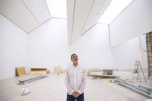Kit Hammonds, chief curator of Museo Jumex, poses in an exhibition space being prepared for the museum's 10th anniversary show "Everything Gets Lighter", opening Nov. 18, at Museo Jumex in Mexico City, Mexico on Sept. 26, 2023. Museo Jumex draws financial support from Eugenio López Alonso, whose family made a fortune with its Grupo Jumex juice business.