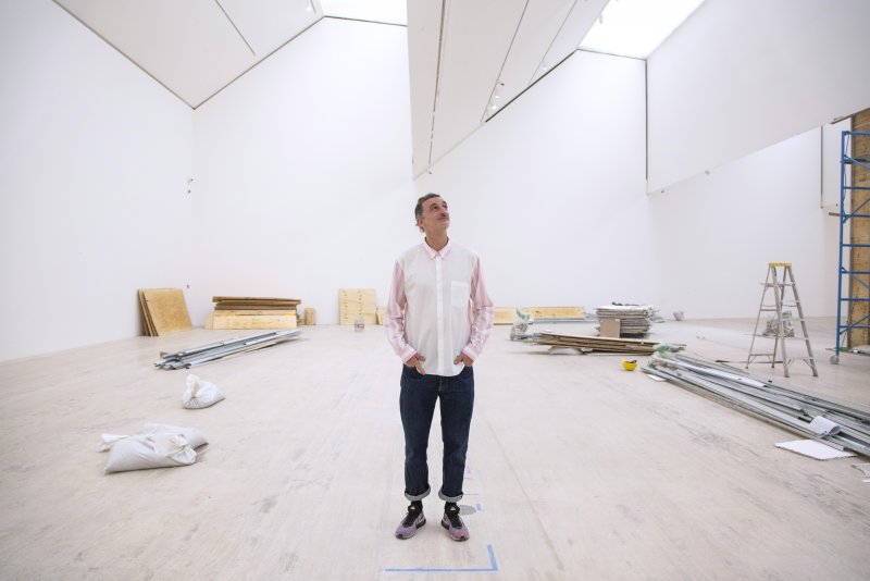 Kit Hammonds, chief curator of Museo Jumex, poses in an exhibition space being prepared for the museum's 10th anniversary show "Everything Gets Lighter", opening Nov. 18, at Museo Jumex in Mexico City, Mexico on Sept. 26, 2023. Museo Jumex draws financial support from Eugenio López Alonso, whose family made a fortune with its Grupo Jumex juice business.