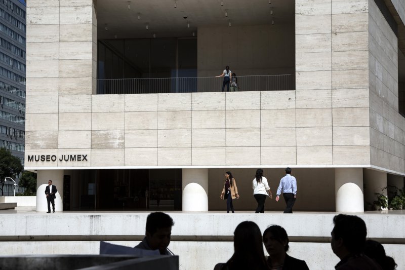People circulate outside the Museo Jumex in Mexico City, Mexico on Sept. 26, 2023. Museo Jumex, whose chief curator is Kit Hammonds, will open its 10th anniversary show "Everything Gets Lighter" on Nov. 18. The museum draws financial support from Eugenio López Alonso, whose family made a fortune with its Grupo Jumex juice business.